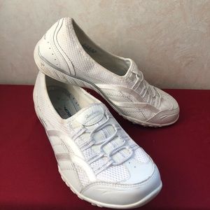 Used white tennis shoes